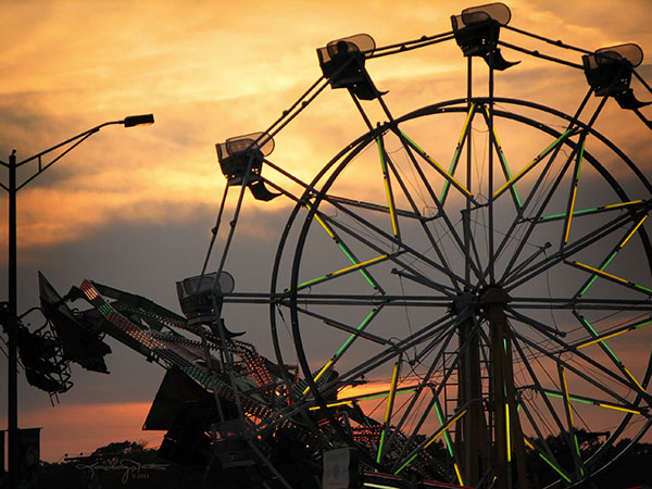 Ferris Wheel at Sunset - against a golden sky